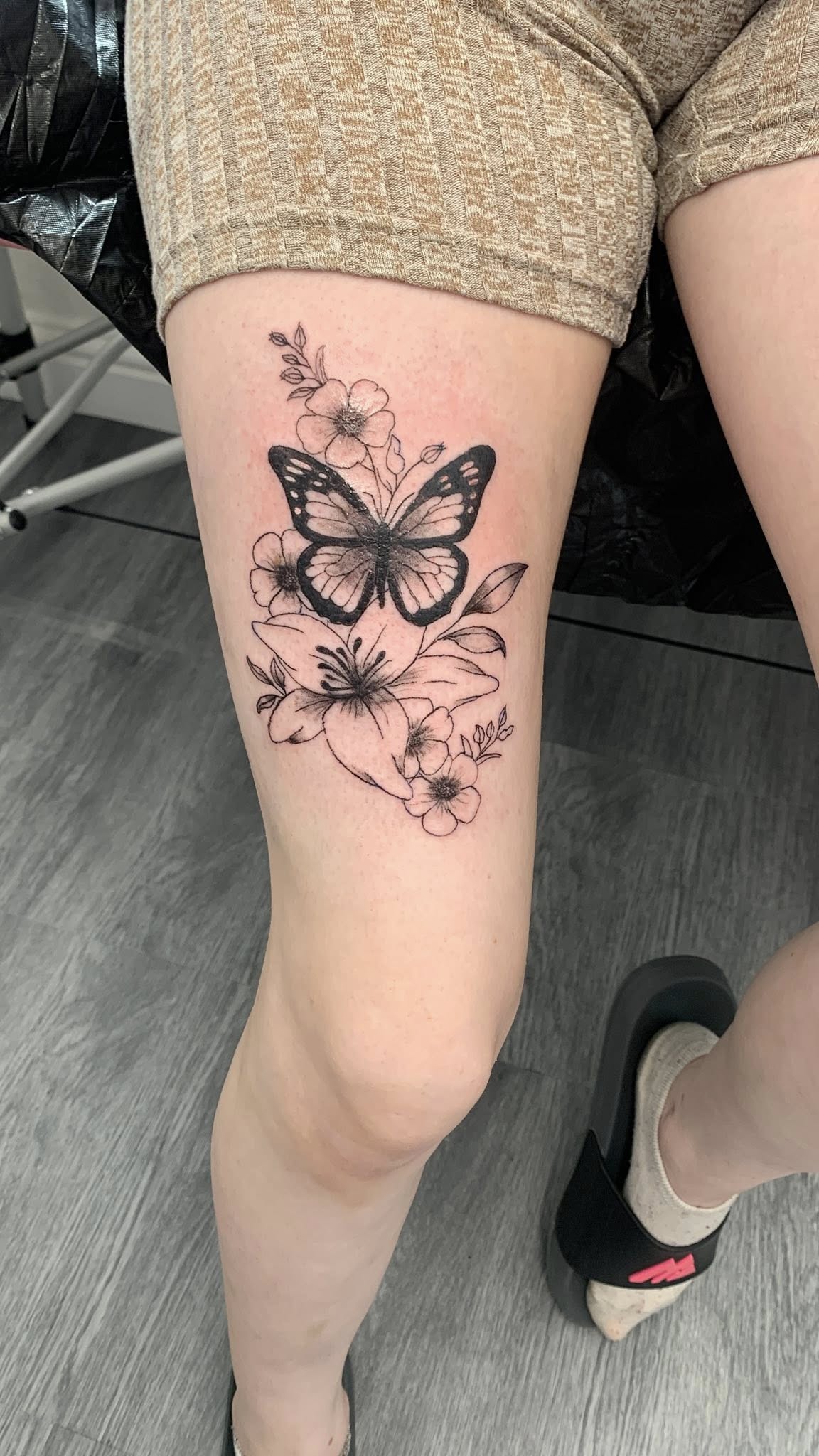 Tiny fine line flower tattoo by Ink By LOLO Merseyside Southport