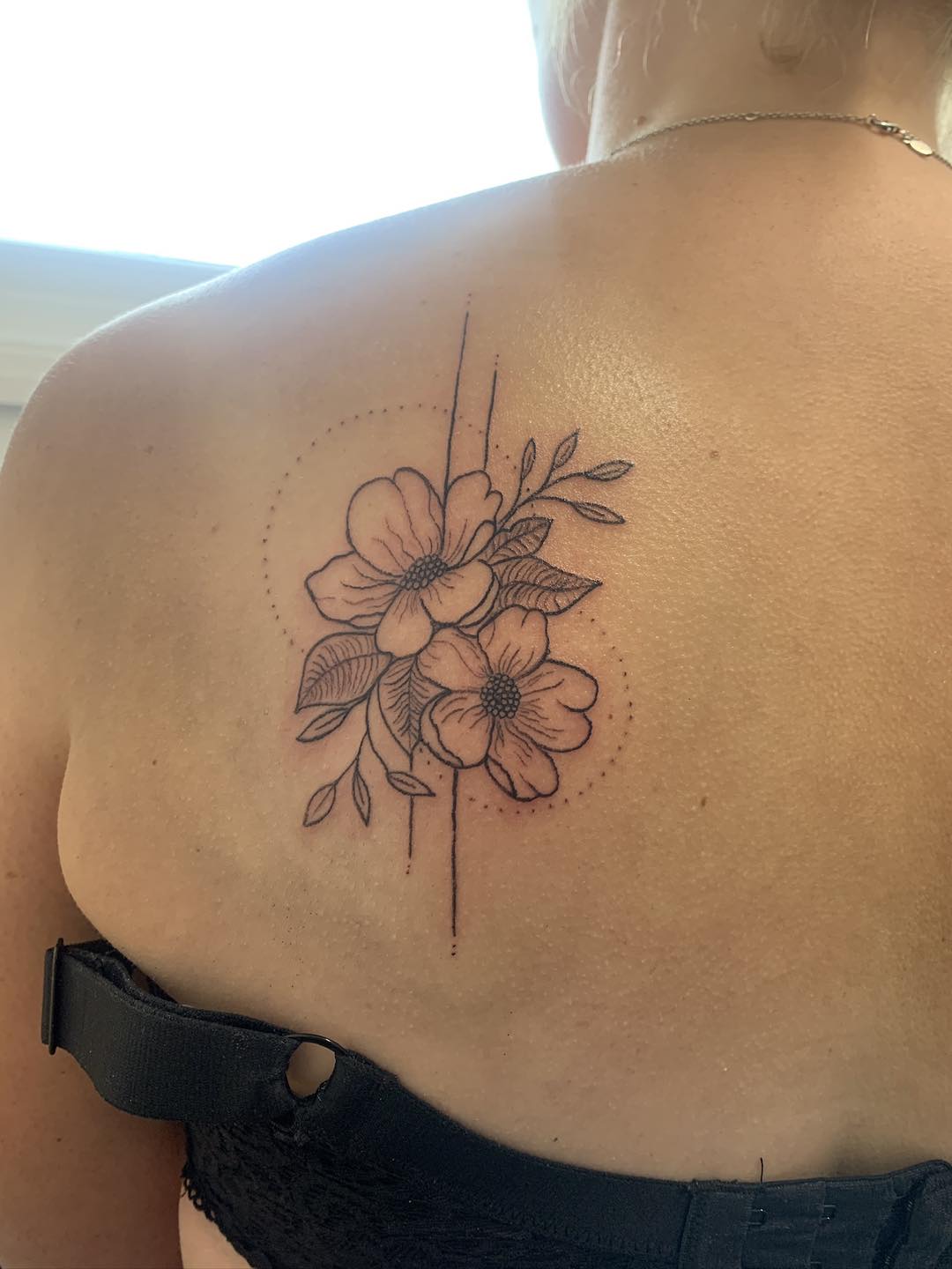 Delicate fine line floral tattoo by Ink By LOLO Merseyside Southport