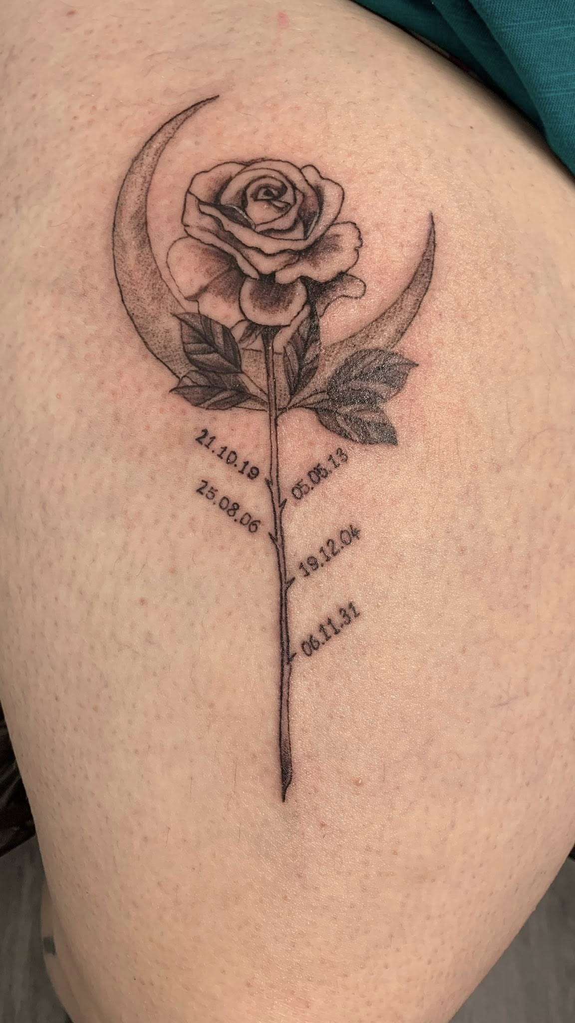 Elegant fine line chain floral tattoo by Ink By LOLO Southport